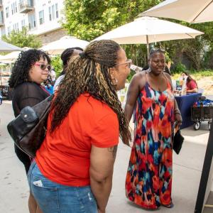 group laughing together at event