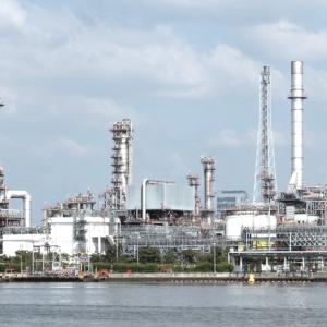 factory sitting along a body of water