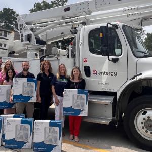 Group photo with Entergy Truck