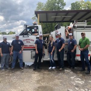 Corrigan Firefighters standing in front of truck