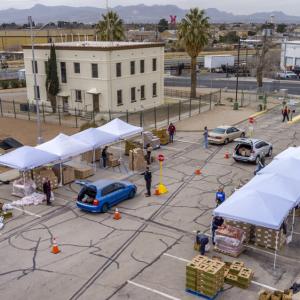 Aerial view of food distribution event in parking lot