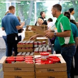 Volunteers packing food