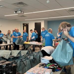 People packing severe weather kits for donation