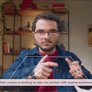 Gabriel in a home setting, digital mapping of his hands and eyes superimposed. 