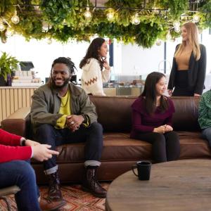 Diverse group of people sitting together and talking
