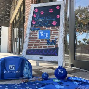 A sign saying "Happy National Dog Day!"