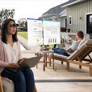 Woman in AR glasses looking at screens