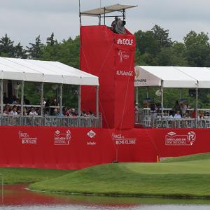 golf course ready for a tournament with plastic fencing