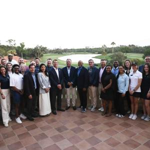 A large group posed outside.