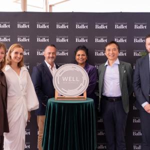 Group accepting award for WELL Certification at the Platinum level