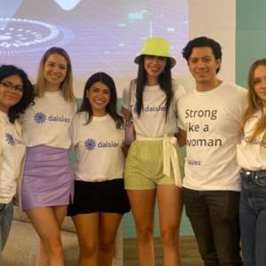 Group of people in daisies shirts