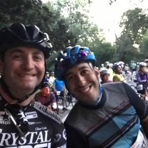 A large group of bike riders waiting.