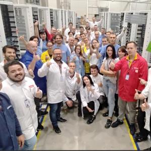 Group pic of employees of the manufacturing plant.