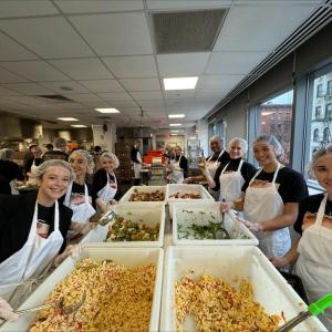 volunteers serving food