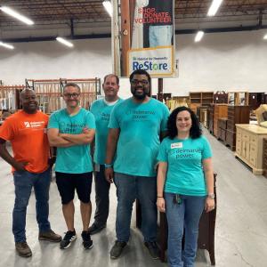 A group of volunteers posed in the store