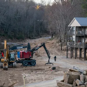 A storm damaged apartment complex in a landscape scarred by Hurricane Helene on March 24, 2025, near Swannanoa, North Carolina. More than six months after the historic storm, communities in western North Carolina continue the recovery process. (Photo by Sean Rayford/Getty Images)