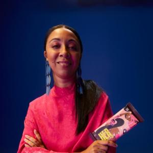 Woman holding Hershey candy bar