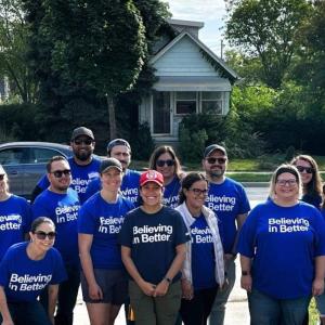 volunteers in blue Kohler t-shirts