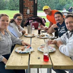 Group eating at a picnic table
