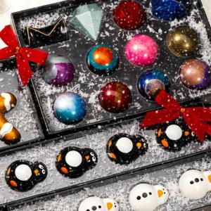 Assortment of ornaments in a gift box.