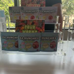 Packaged foods in a rack on a table