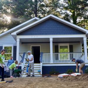 people building a house