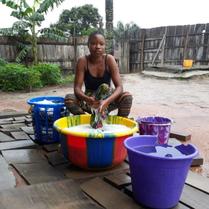 Someone handwashing clothes