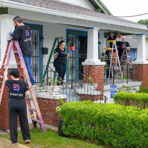 people working on a house