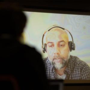 A person appearing by virtual stream.