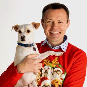 Daniel Grosu holding his puppy Nala