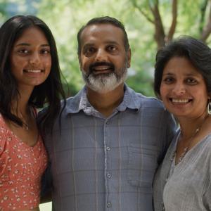 Photo of AJ Patel, his wife and daughter.