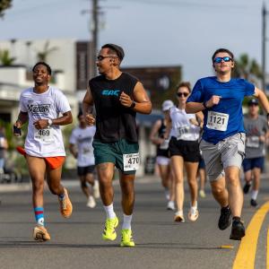 Participants run along a coastal roadway during the 2026 LA Kings 5K in South Redondo Beach, supporting Kings Care Foundation programs focused on youth wellness, inclusion and community impact.
