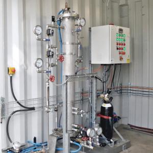 apparatus featuring several valves, gauges, pipes and a control panel