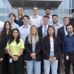 A group of interns posed outside a Henkel facility