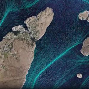 Aerial view of many small islands in a large body of water.