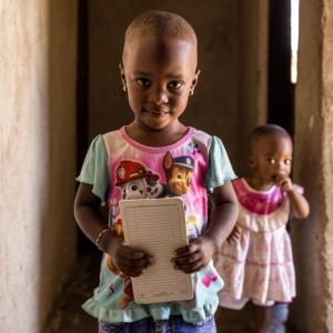 Mwajuma's grandchild has recovered her health, with support from Janet.