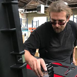 Jedidiah Moss focused on a part