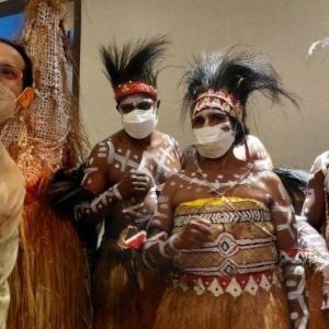 people standing together Kamoro Art Exhibition & Sale