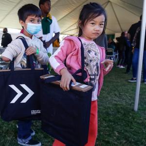 Youth at Saint Rest Baptist Church in Fresno receiving their free laptops from Comcast’s Internet Essentials and Project UP. 