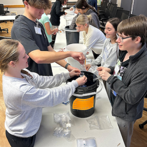 Students shown recycling.