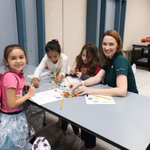 Kids at a table with Jill Anderson