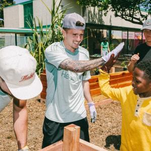 Volunteers helped plant a variety of fruits, vegetables, and flowers.