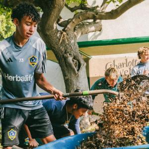 Volunteers helped mulch and lay down fresh soil.
