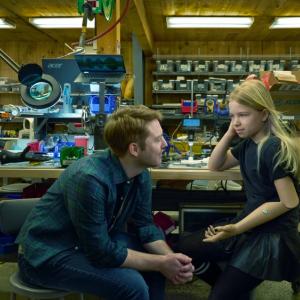 Man and a girl with a prosthetic arm