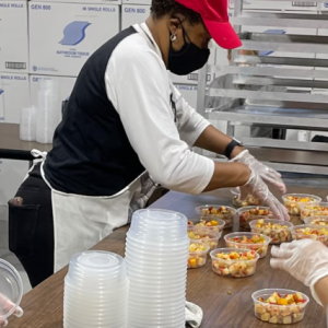 Volunteers prepping food