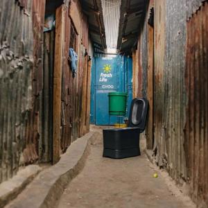 the Loope portable toilet in an enclosed space.