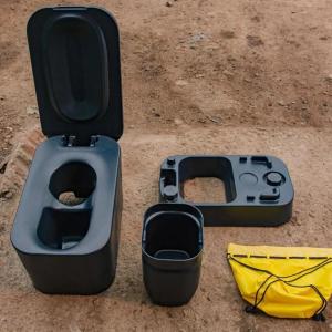 The loope toilet unassembled in pieces.