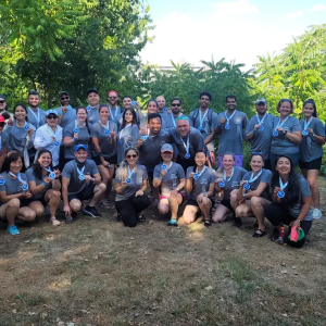 Group photo of people wearing medals