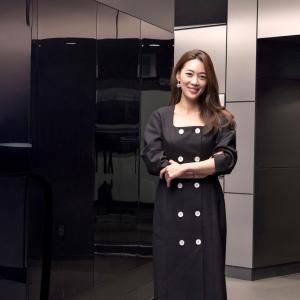 person standing and smiling