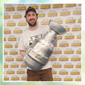 Miller with the hockey tournament’s championship cup.